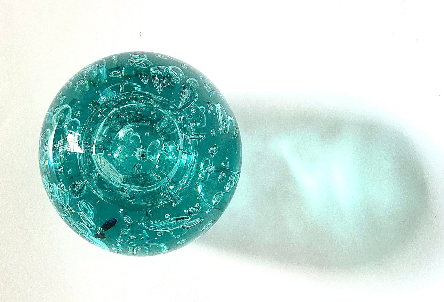 A Murano paperweight / room fragrance diffuser in sea green