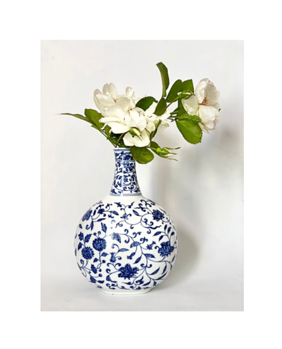 A blue and white porcelain oval jug, vase and candlestick .