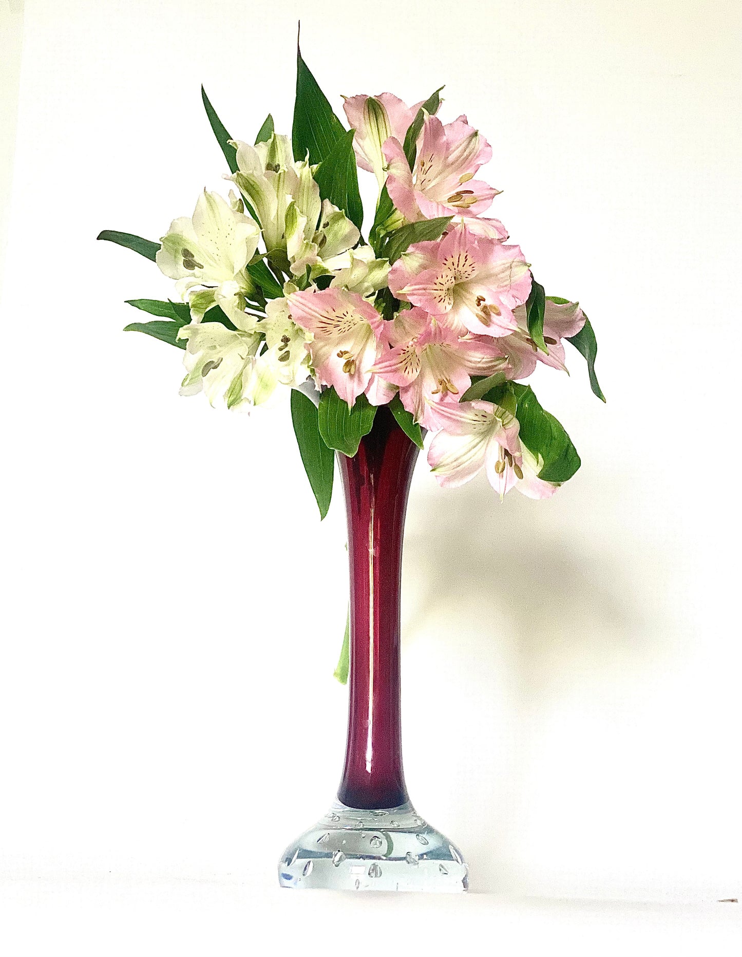 A Murano Sommerso vase / candlestick in a deep cherry red