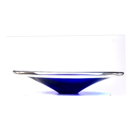 A clear and deep indigo blue cased art glass bowl.