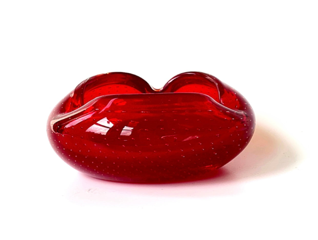 A Murano cherry red glass bowl.