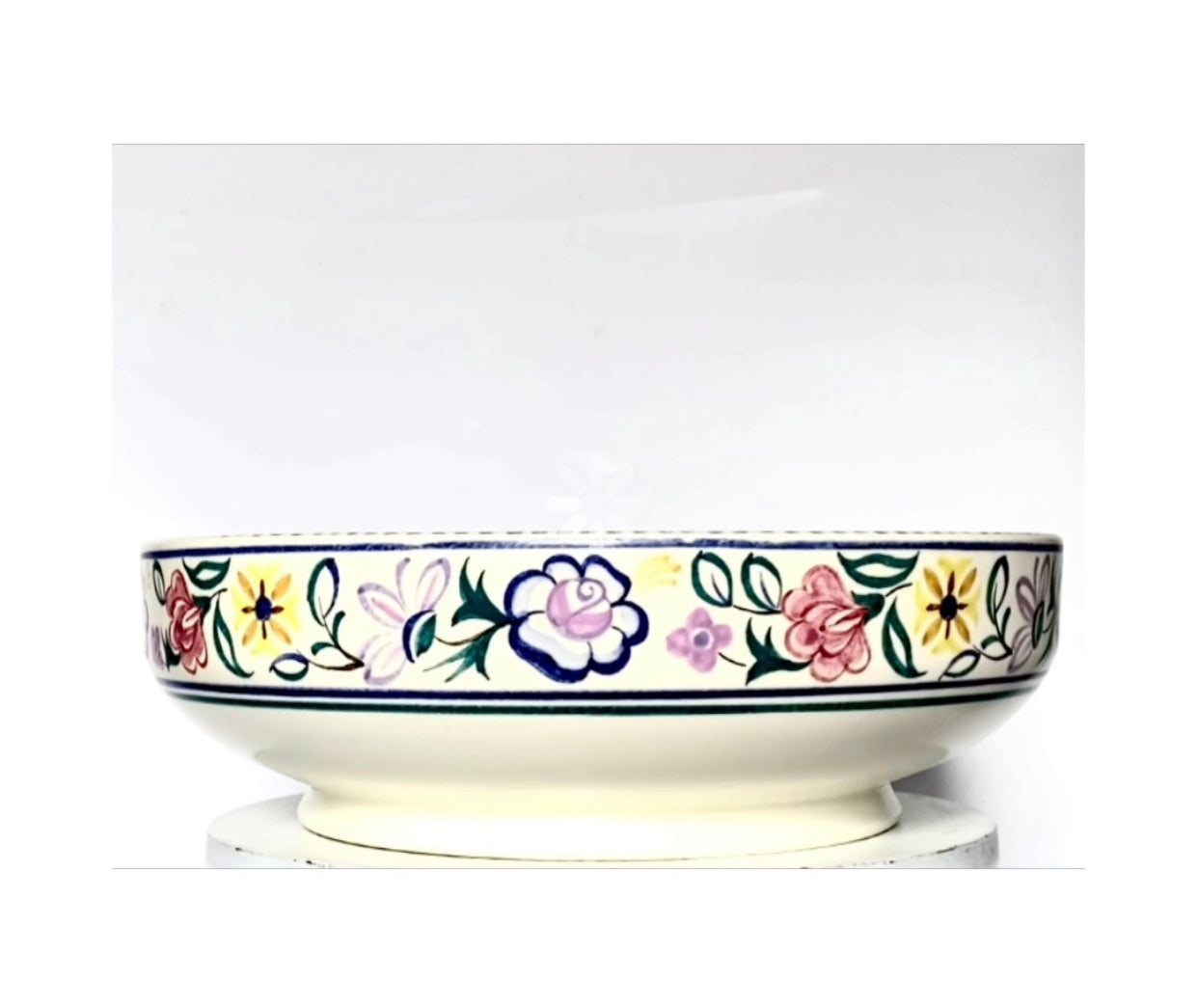 A Poole porcelain serving bowl .