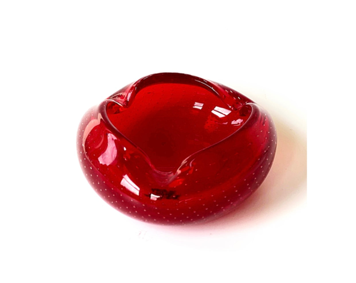 A Murano cherry red glass bowl.