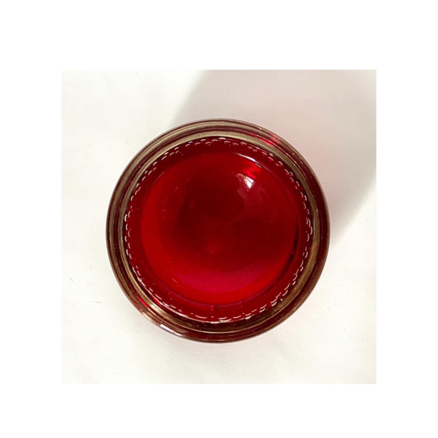 A Whitefriars glass bowl in blood red