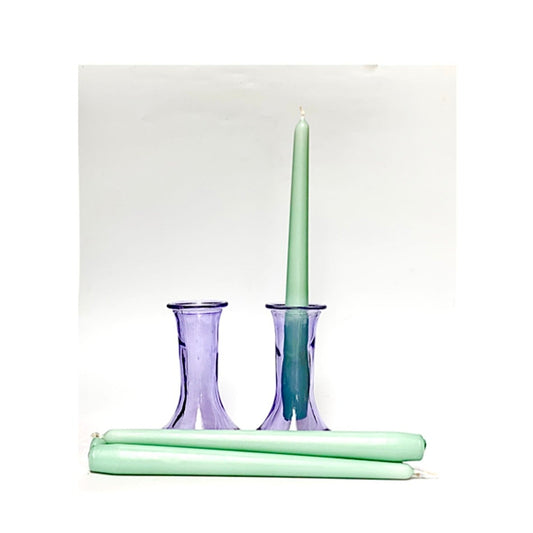 A pair of soft violet glass candlesticks plus four candles of your choice .