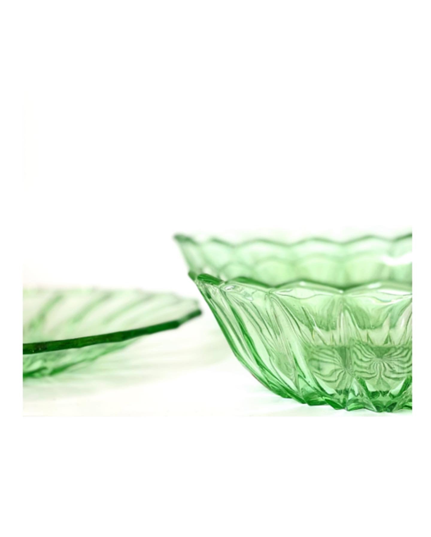 A perfect set of star cut glass bowls and a plate.