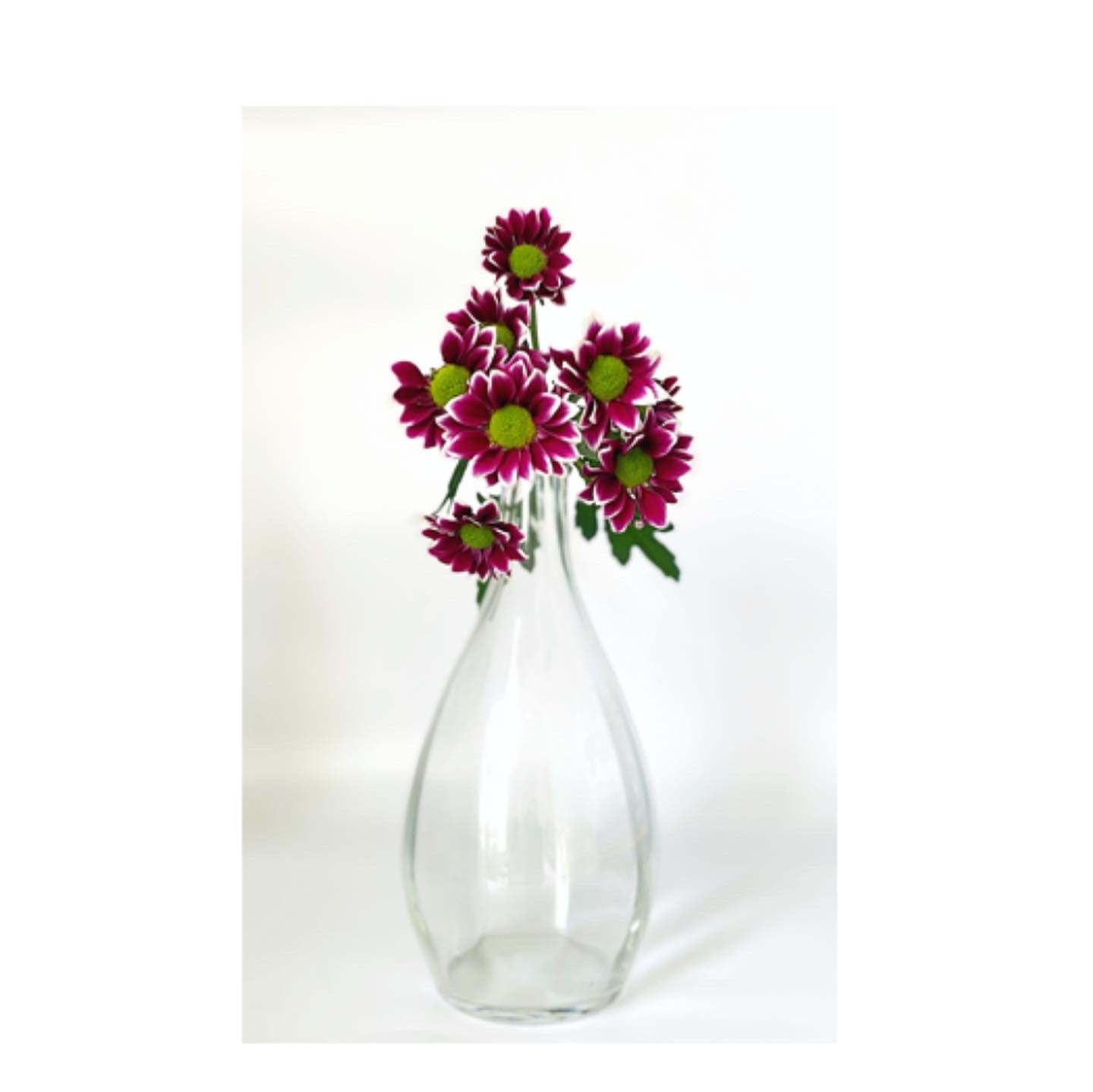 A pair of vintage glass vases and jug bottles.