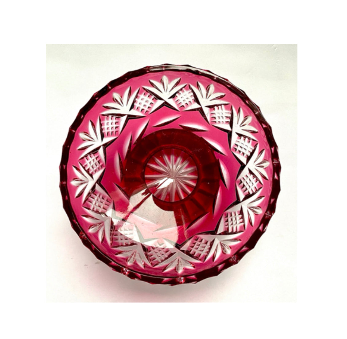 Cranberry red cut glass pedestal dish.