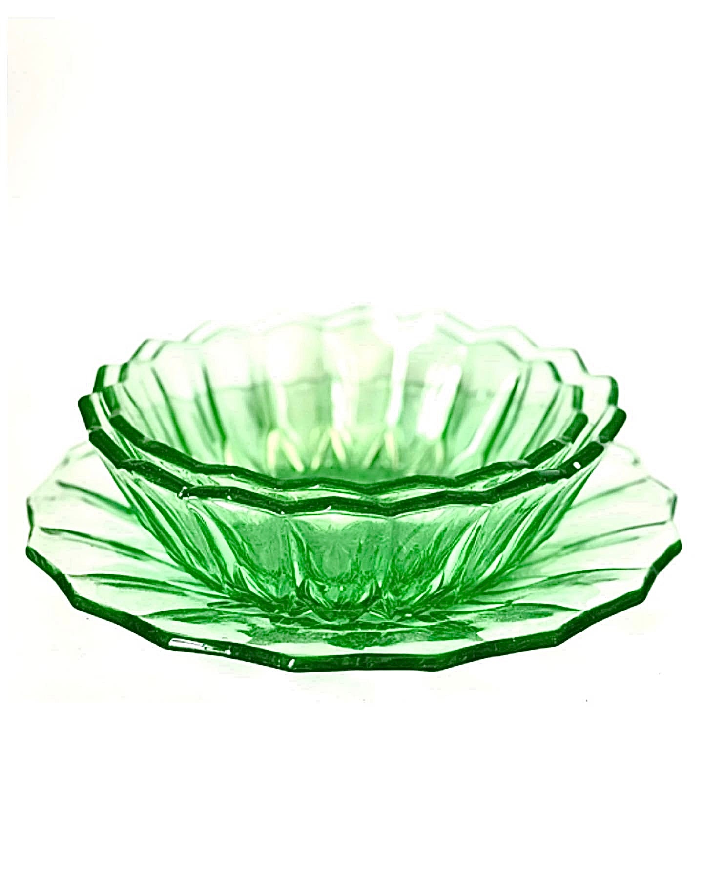 A perfect set of star cut glass bowls and a plate.