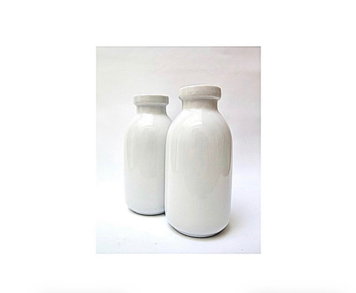 A pair of porcelain 'Milk Bottles’