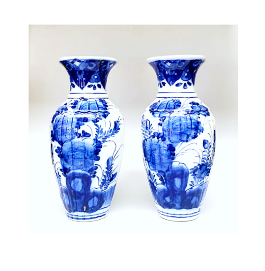 Pair of blue and white ceramic vases.