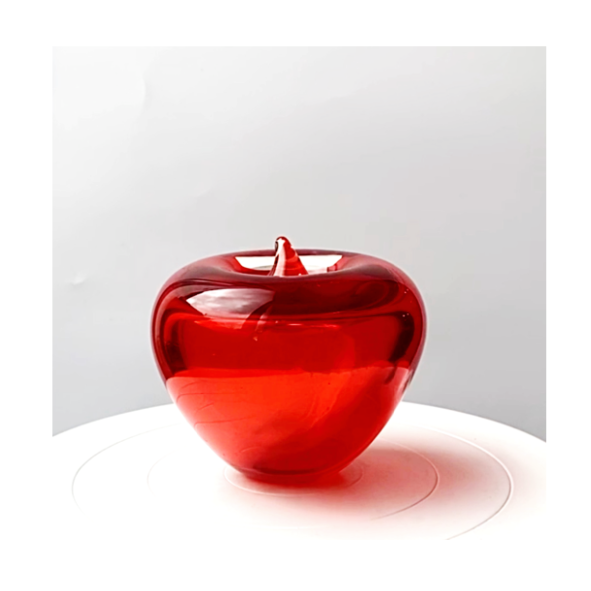 A Murano scarlet rose red glass apple paperweight