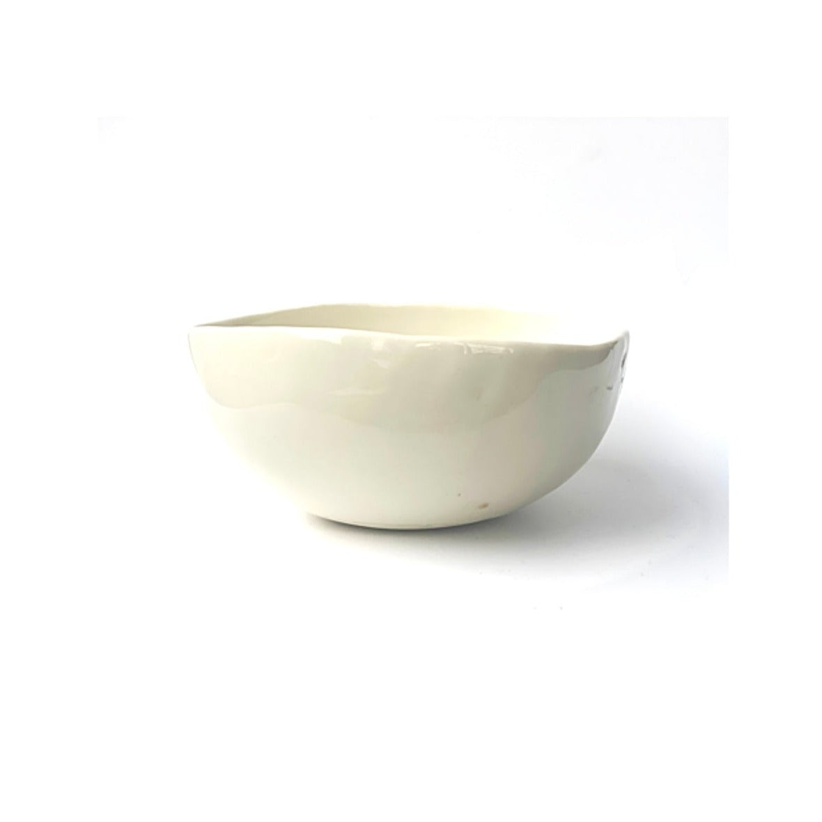 A porcelain bowl in a clear stoneware glaze.